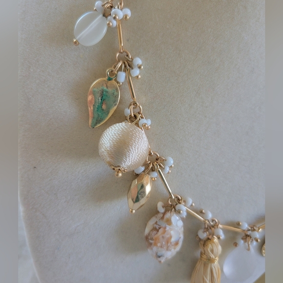 NWT Pretty Gold Tone Asymmetric Mixed Media Charm Necklace - Picture 8 of 11